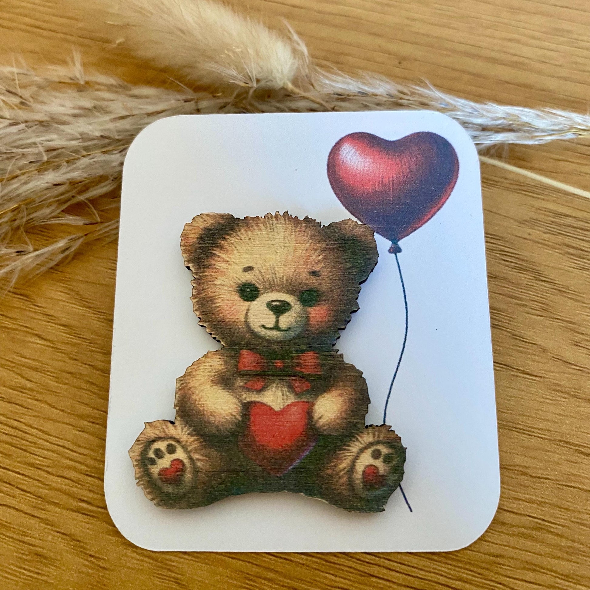 Câlin de poche bois naturel motif ours avec cœur