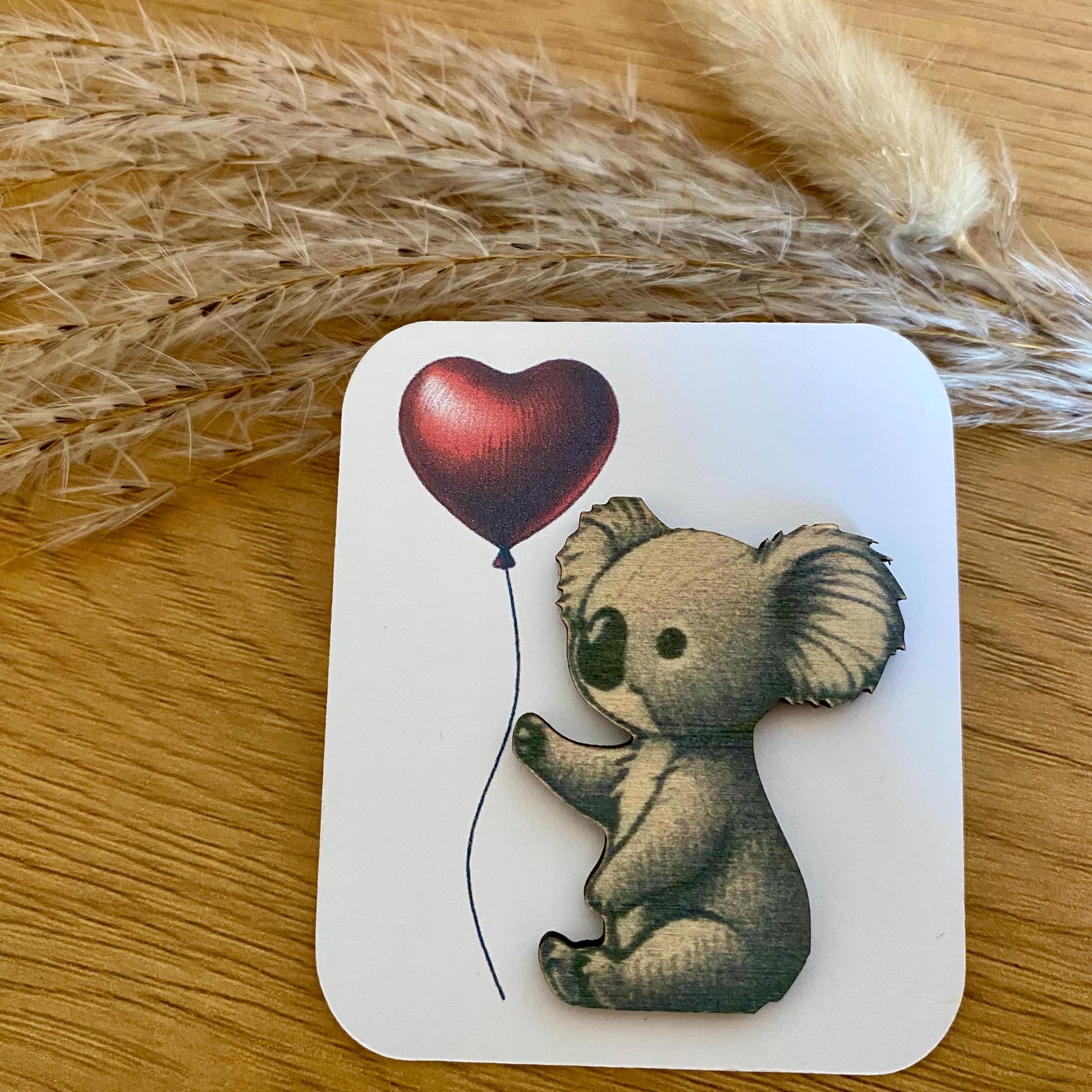 Petit koala en bois cadeau réconfortant