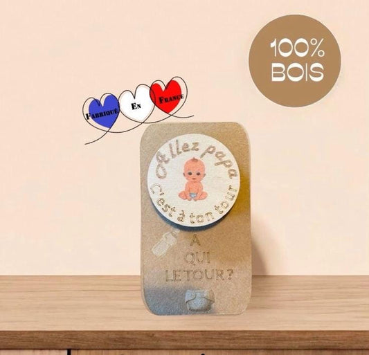 Jeton de décision recto/verso avec les mentions "Papa" et "Maman", présenté sur une surface en bois.