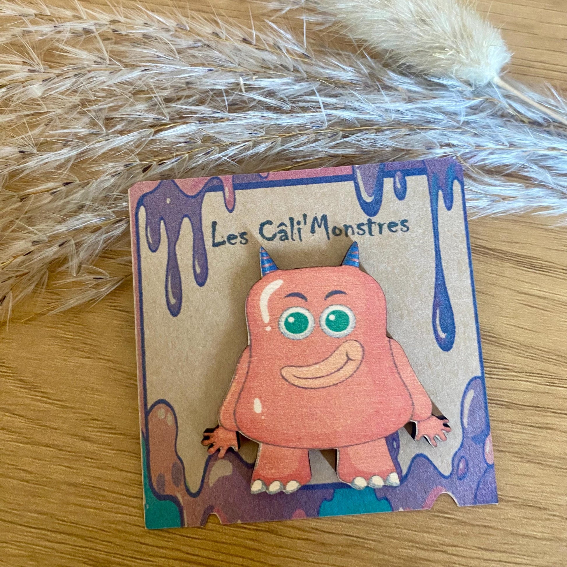 Cadeau original enfant monstre en bois